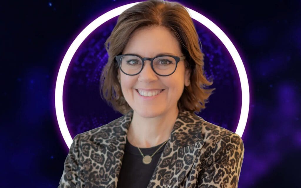 Radiant portrait of Ann Handley, celebrated Wall Street Journal Bestselling Author and Keynote Business Speaker, exuding warmth in a stylish suit and glasses, against a mesmerizing galaxy-themed backdrop of black and purple. Enhanced with a subtle 'circular ring light' effect accentuating her presence.