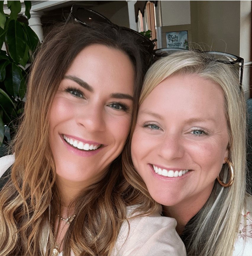 Photo of Erin King, a Keynote Speaker, and Ashley Jackson, Muti-Million Founder of Courage Nation, smiling happily at the camera together. They are best friends.